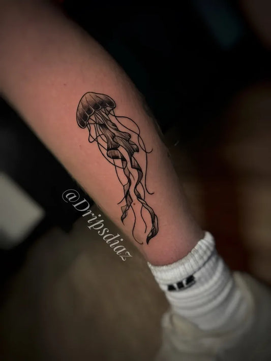 Small Black and Grey Jellyfish Tattoo on Women Arm by @dripsdiaz