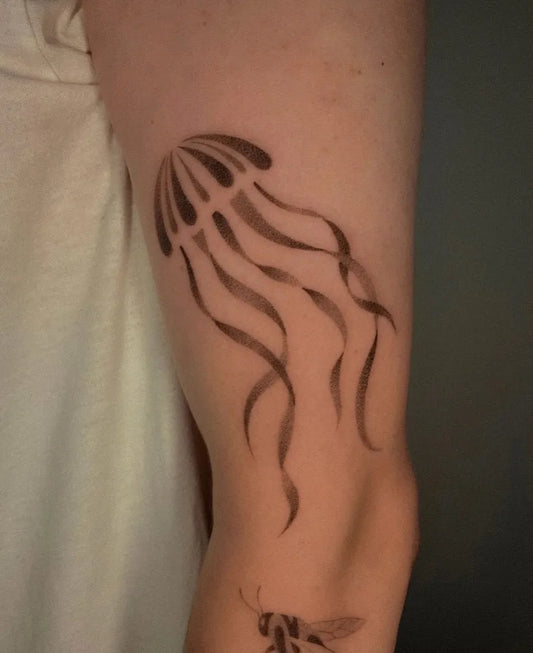 Small Black and Grey Jellyfish and Bee Tattoo on Women Arm by @kemp_ink