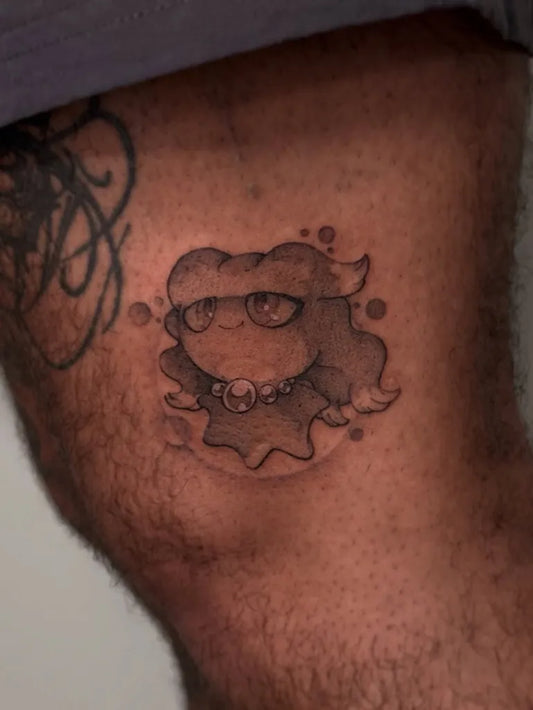 Small Black and Grey Jigglypuff Tattoo on Men Thigh by @tm.jared.tattoos