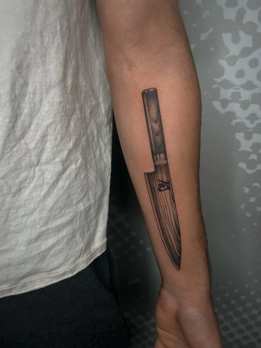 Small Black and Grey Knife Tattoo on Men Arm by @hb_tattooer