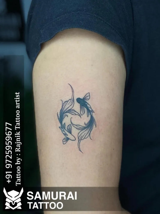 Small Black and Grey Koi Fish Tattoo on Men Arm by @samurai_tattoo_mehsana