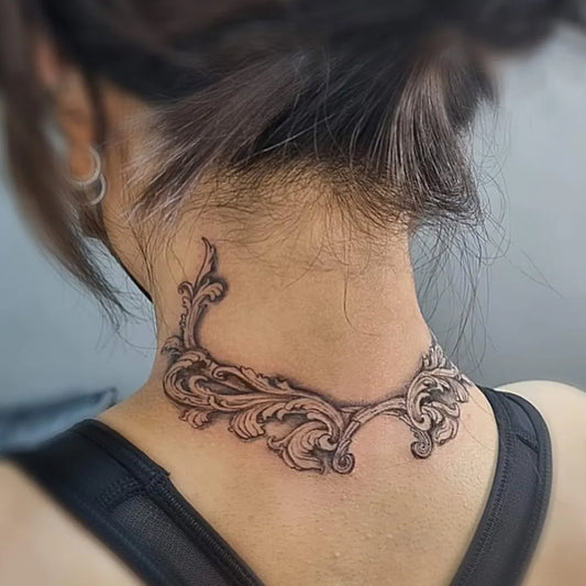 Small Black and Grey Laurel Wreath Tattoo on Women Neck by @tattsmatter