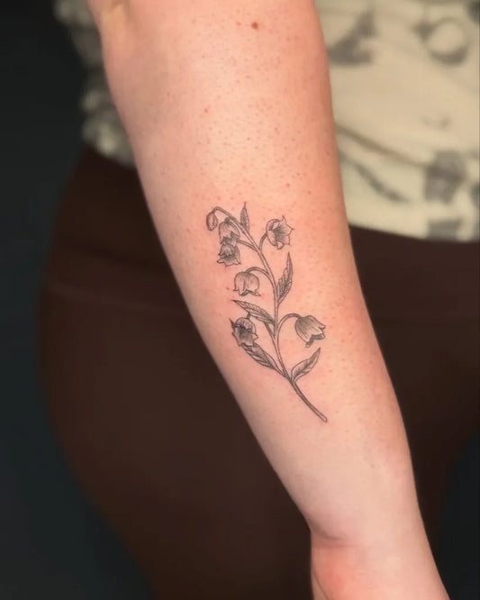 Small Black and Grey Lily of the Valley Women Arm Tattoo by @souplemon