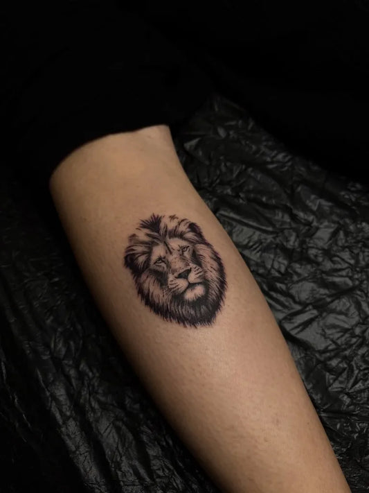 Small Black and Grey Lion on Women Arm Tattoo by @onlychapo_