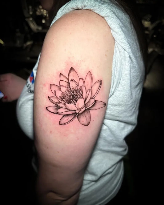 Small Black and Grey Lotus Flower on Women Arm Tattoo by @iho_by_sarah_fetla
