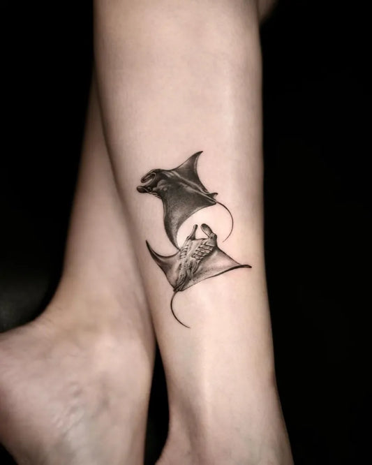 Small Black and Grey Manta Rays Tattoo on Women Leg by @salttattooing