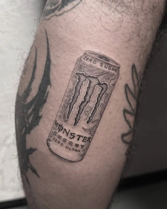Small Black and Grey Monster Energy Can Tattoo on Men Leg by @vanytintenherz