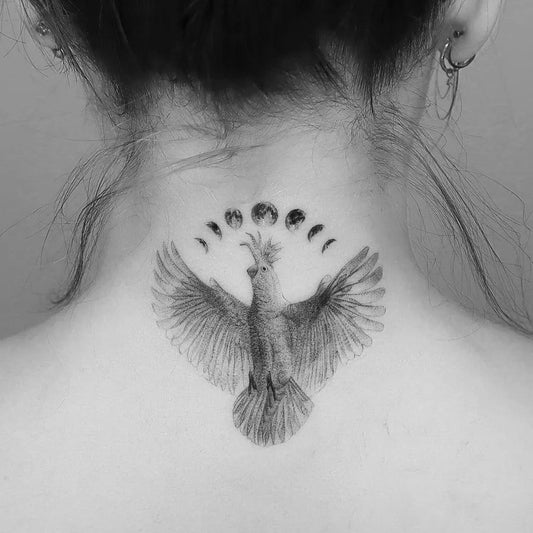 Small Black and Grey Moon Phases Cockatoo Tattoo on Women Neck by @wonniiink