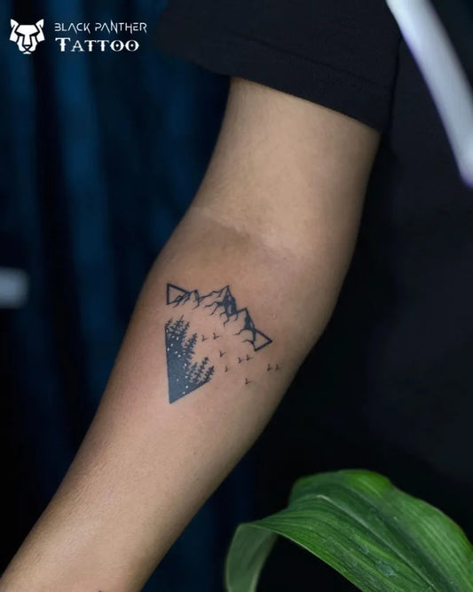 Small Black and Grey Mountain and Trees Tattoo on Women Arm by @_blackpanther_tattoo_
