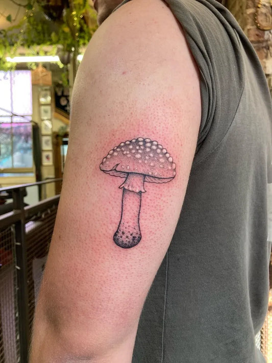 Small Black and Grey Mushroom on Men Arm Tattoo by @elphie.quinn