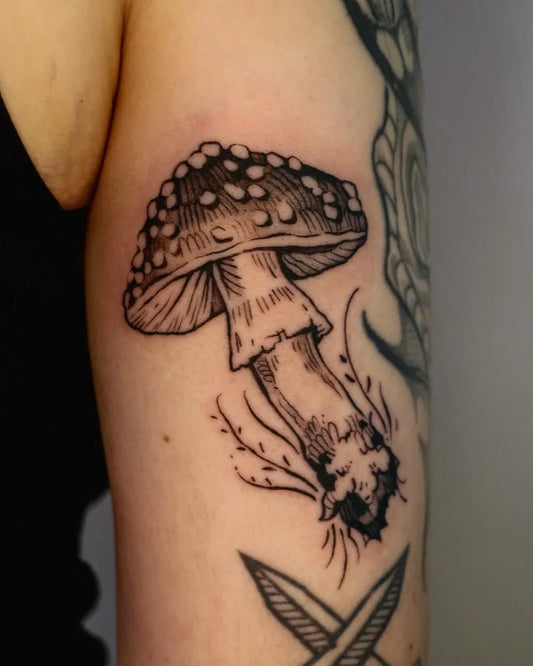 Small Black and Grey Mushroom with Roots on Women Arm Tattoo by @baldpeaches