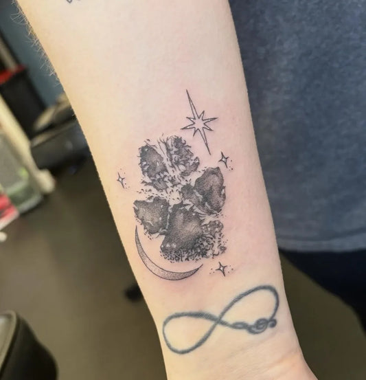 Small Black and Grey Paw Print Moon Infinity Tattoo on Women Arm by @jessicaeve_tattoo