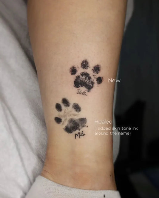 Small Black and Grey Paw Print Tattoo on Women Ankle by @cien_ink