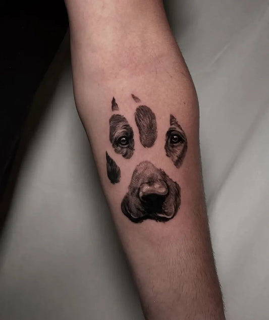 Small Black and Grey Paw Print with Dog Face Tattoo on Men Forearm by @bigsleepsink