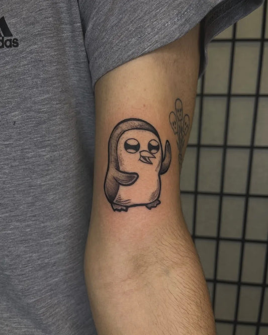 Small Black and Grey Penguin Tattoo on Men Arm by @brandonartmendes