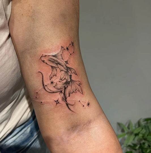 Small Black and Grey Pisces Fish Constellation Tattoo on Women Arm by @getinkedbymeg