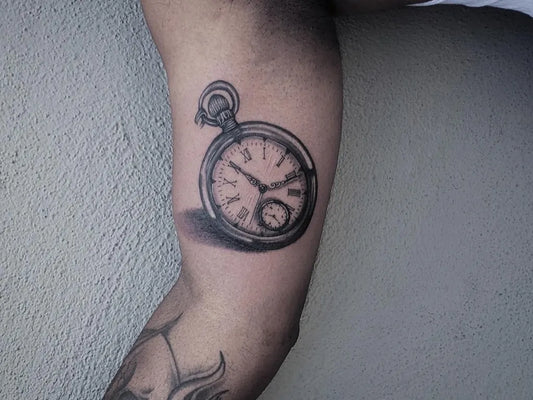 Small Black and Grey Pocket Watch Tattoo on Men Arm by @inknerd7