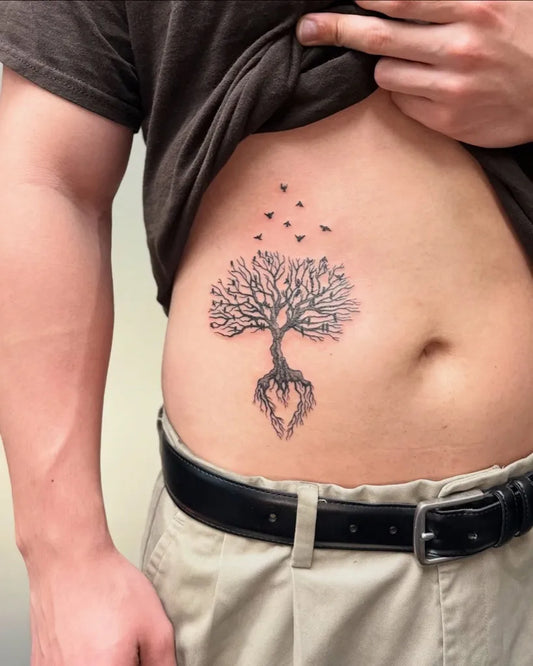 Small Black and Grey Poison Tree with Birds and Heart Roots on Men Abdomen Tattoo by @yawnsnarlos