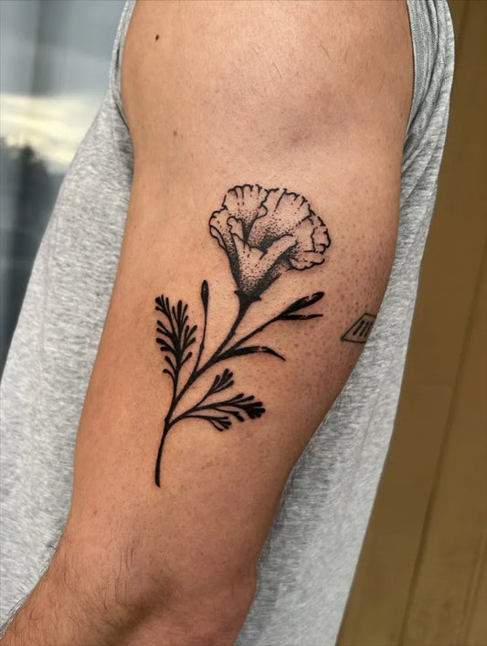 Small Black and Grey Poppy Tattoo on Men Arm by @cvleb.ttt