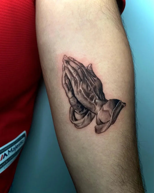 Small Black and Grey Praying Hands Tattoo on Men Arm by @luees___
