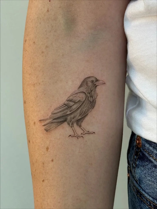 Small Black and Grey Raven on Women Arm Tattoo by @deecarl