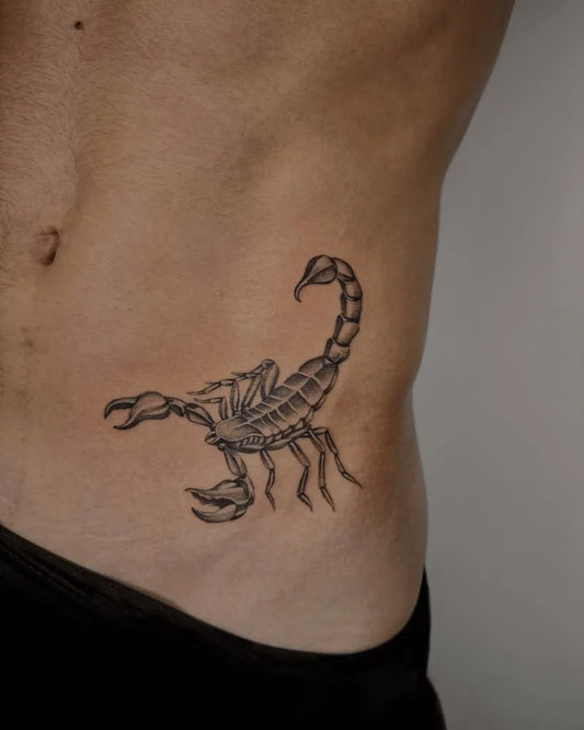 Small Black and Grey Scorpion on Men Abs Tattoo by @beatattooartist