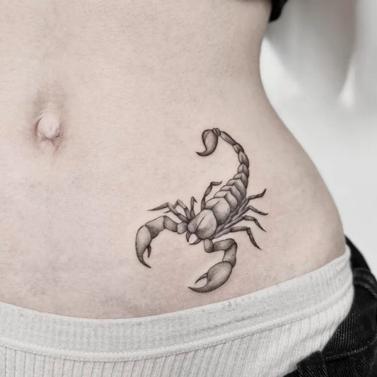 Small Black and Grey Scorpion on Women Hip Tattoo by @annamillertattoo