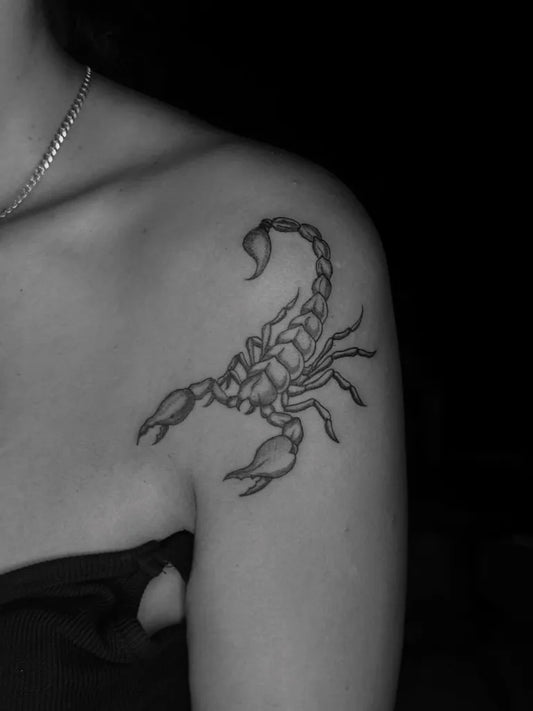Small Black and Grey Scorpion on Women Shoulder Tattoo by @himera.ink_tattoo.studio