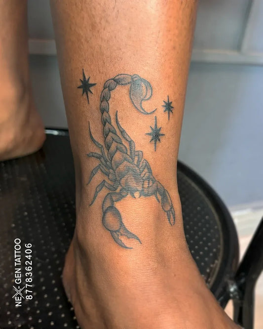 Small Black and Grey Scorpion with Stars and Moon on Women Leg Tattoo by @nexgentattoo