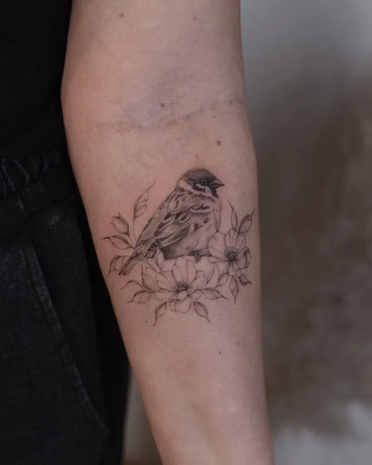 Small Black and Grey Sparrow Flowers Tattoo on Women Forearm by @kawka.ink.a