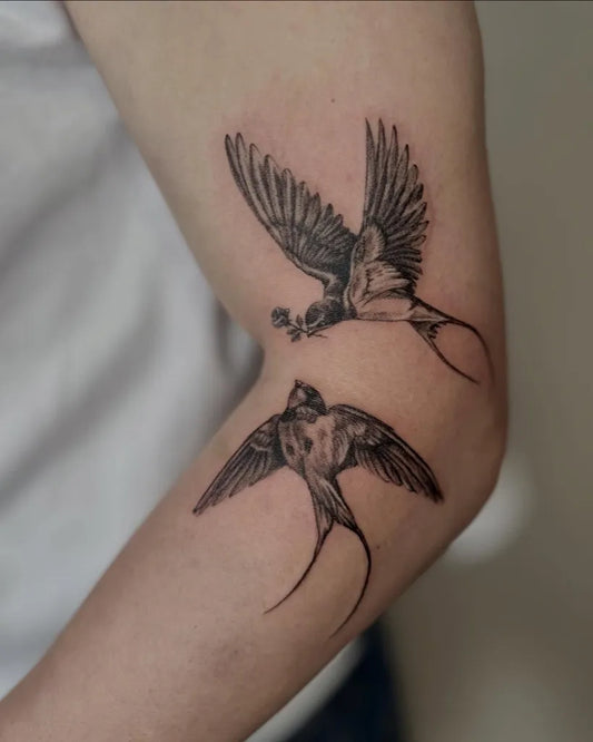 Small Black and Grey Sparrows Tattoo on Women Arm by @asongtattoo