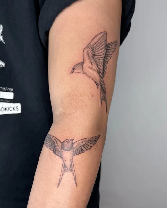 Small Black and Grey Sparrows Tattoo on Women Arm by @zac.inks