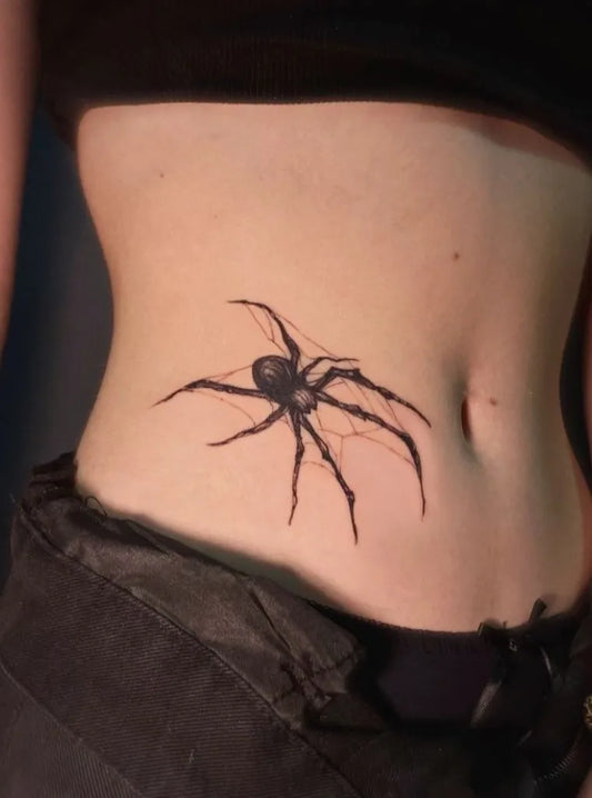 Small Black and Grey Spider on Women Side Tattoo by @txlegendstattoo