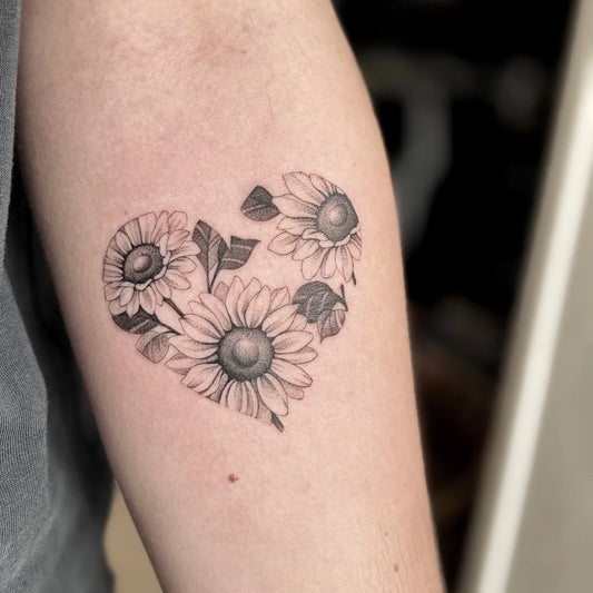 Small Black and Grey Sunflower Heart on Women Arm Tattoo by @daisymcqueen