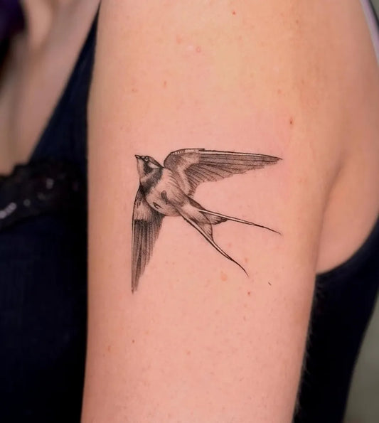 Small Black and Grey Swallow Tattoo on Women Arm by @thuwa.tat