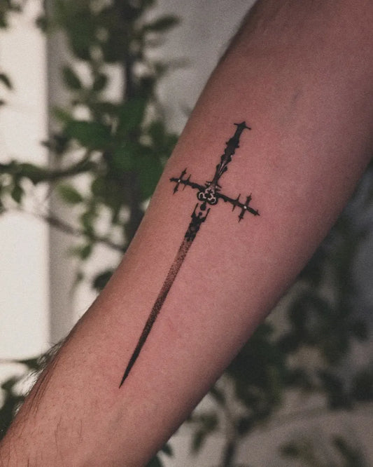 Small Black and Grey Sword Cross on Men Arm Tattoo by @dante.impaler