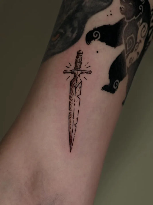 Small Black and Grey Sword on Men Arm Tattoo by @forestwitch_bowien