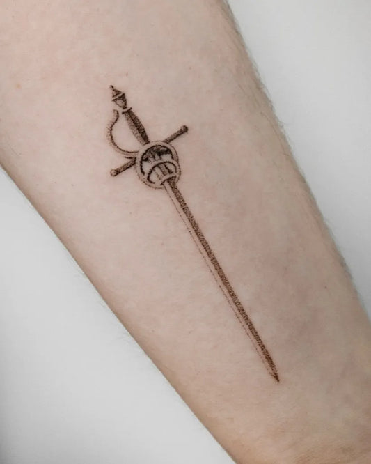 Small Black and Grey Sword on Men Arm Tattoo by @keenetattoo