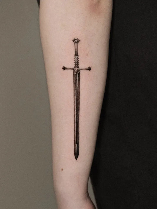 Small Black and Grey Sword on Men Arm Tattoo by @rosietattooer