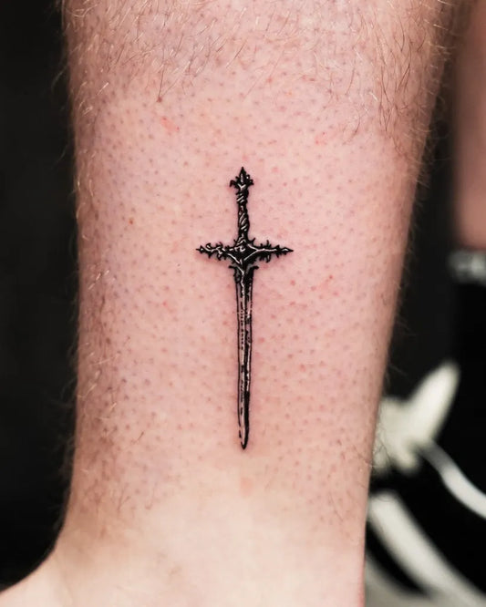 Small Black and Grey Sword on Men Leg Tattoo by @wrightonadesign