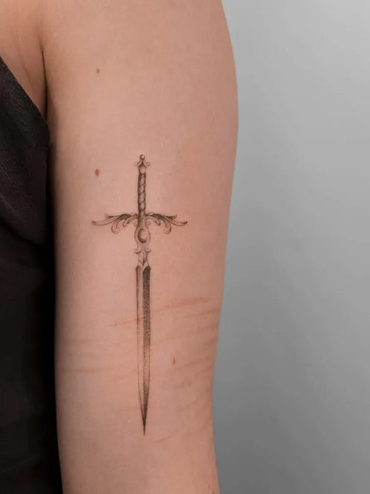 Small Black and Grey Sword on Women Arm Tattoo by @tattoosby_elise