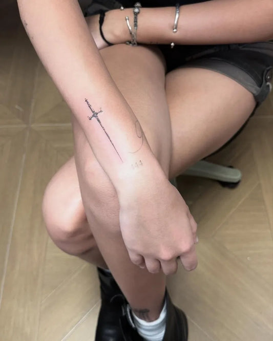 Small Black and Grey Sword on Women Forearm Tattoo by @tattoo_yue