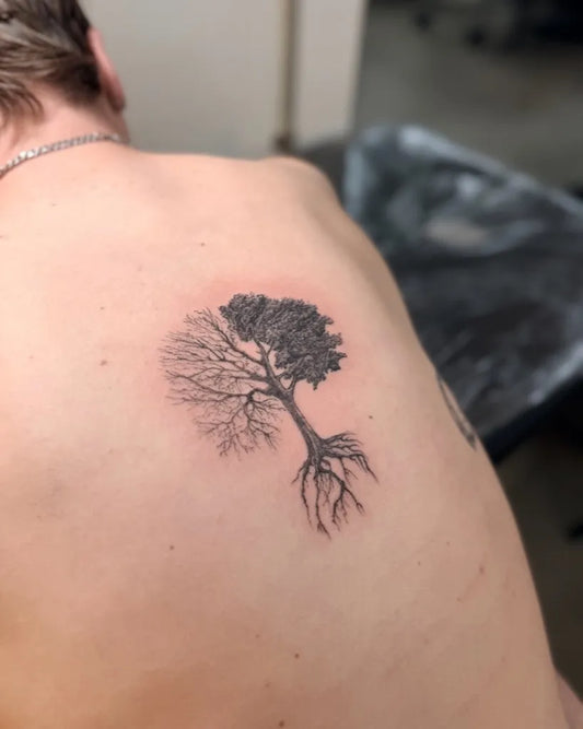 Small Black and Grey Tree Tattoo on Men Back by @ronniehtatts