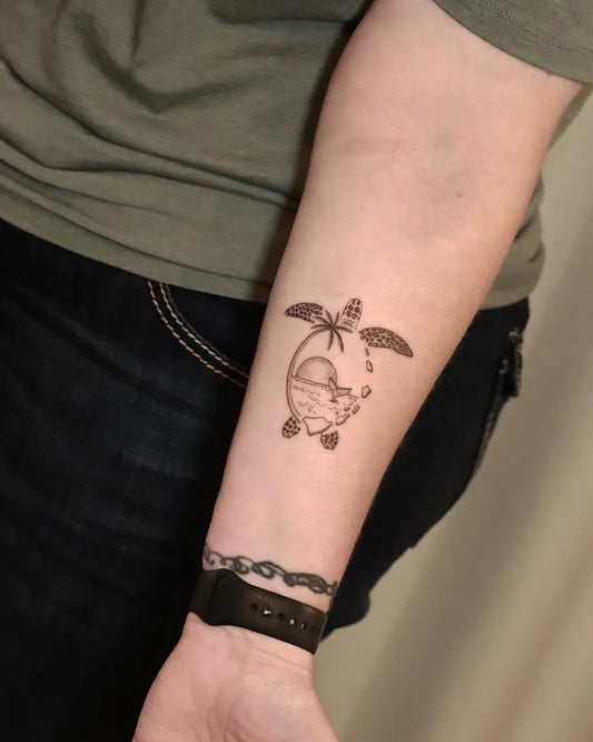 Small Black and Grey Turtle and Palm Tattoo on Women Forearm by @animeogtattoo