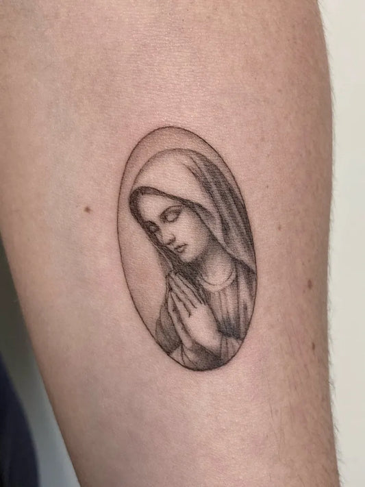 Small Black and Grey Virgin Mary Tattoo on Women Arm by @suendige_haut_tattoo