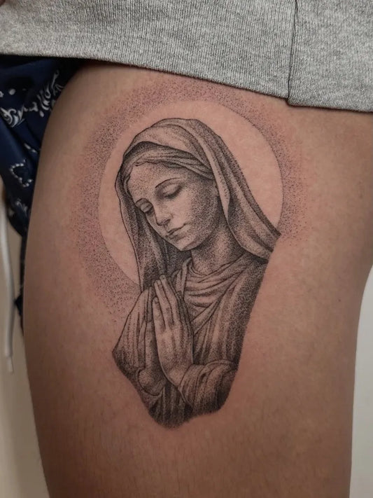 Small Black and Grey Virgin Mary Tattoo on Women Thigh by @eleyyyy_