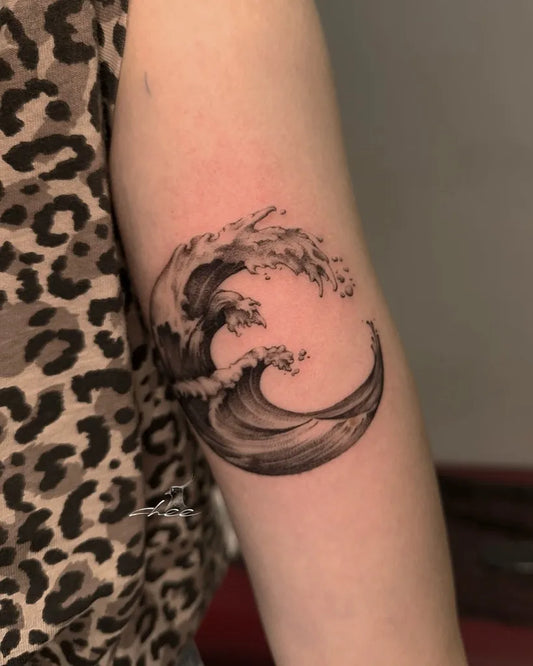 Small Black and Grey Wave Moon Tattoo on Women Arm by @chee.tattoo