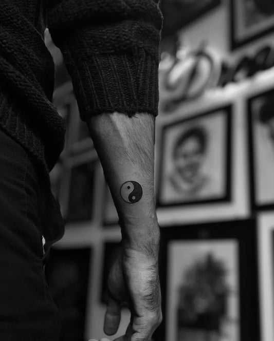 Small Black and Grey Yin Yang Tattoo on Men Arm by @artline_artist_tattoo
