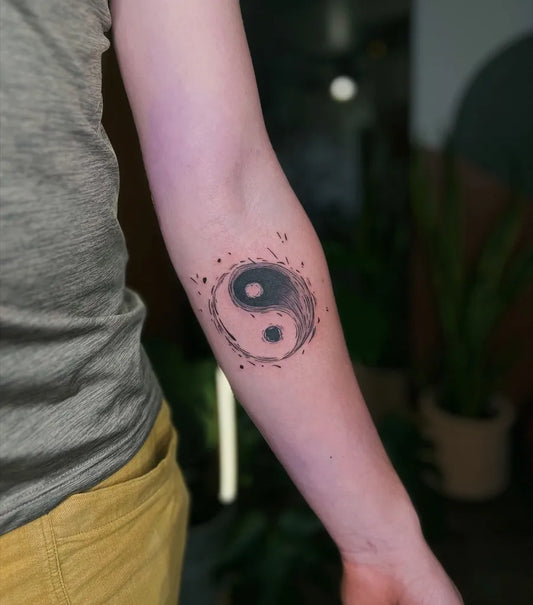 Small Black and Grey Yin Yang with Dots Tattoo on Women Arm by @lexcreotattoos