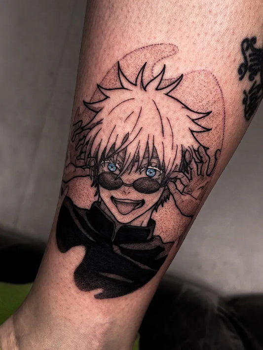 Small Black and White Satoru Gojo on Women Leg Tattoo by @stelu.tattoo